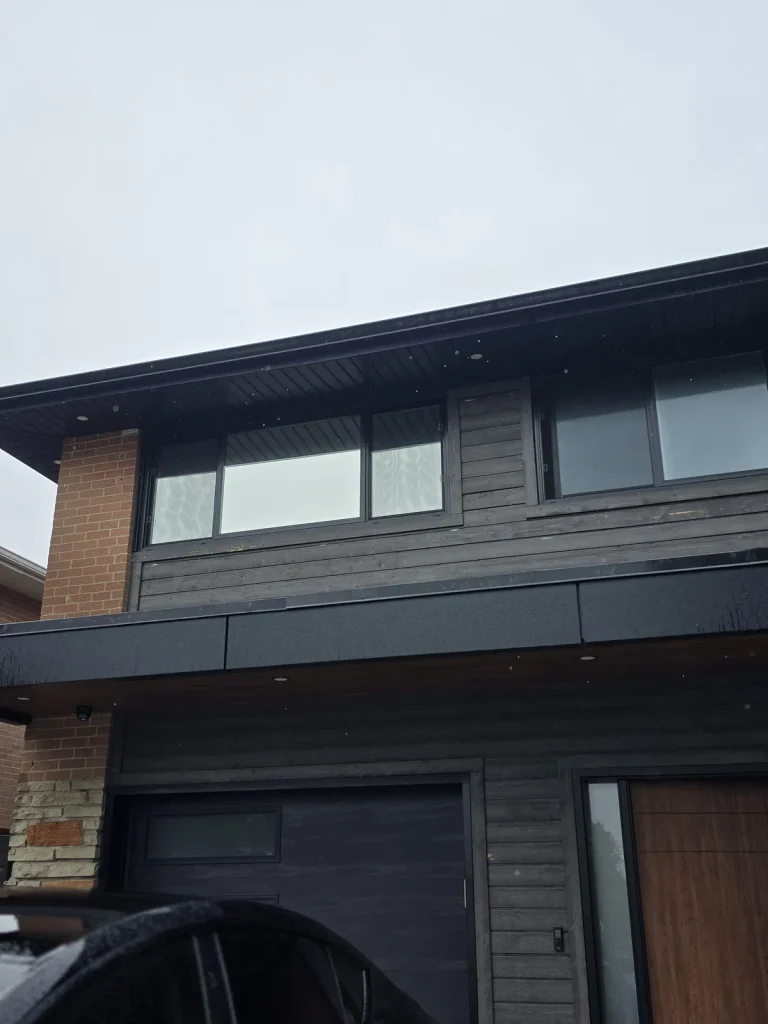 Frosted privacy film on second-floor windows of a modern home in Mississauga, ON by NanoQrtz